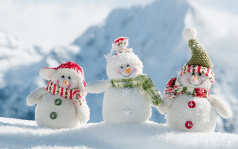 Cute and cosy snowmen