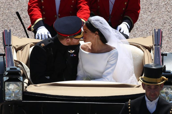 Prince Harry and Meghan Markle kiss