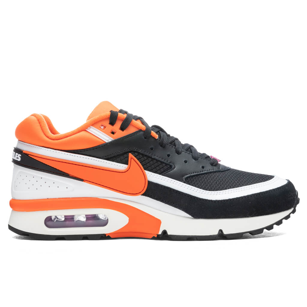 orange white and black nike air max