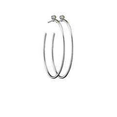 looped diamond ear rings in silver