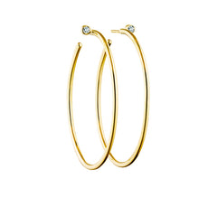 looped diamond ear rings in 18 carat gold
