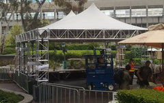 Stretch tent truss stage