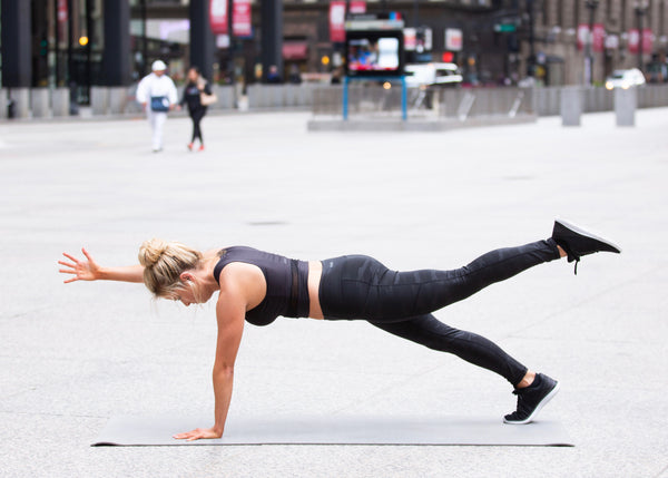 alternating plank bird dog - core workout - yoga workout- yoga asanas - camo leggings - crop top