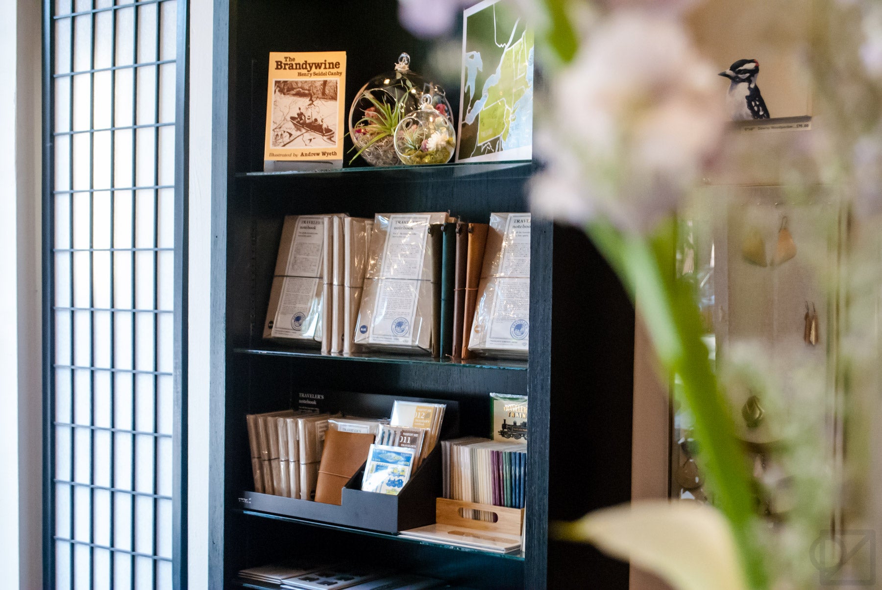 Peering through the flowers to our TRAVELER'S Company nook