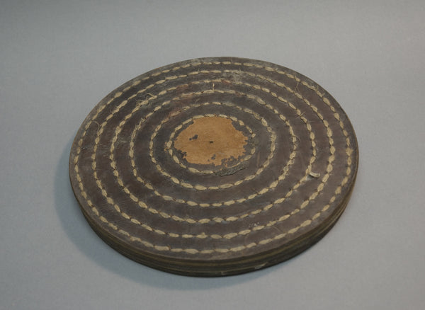 A leather polishing wheel for jade (Metropolitan Museum of Art)