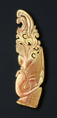 An amber phoenix used as an ornamental plaque, dating from the Liao dynasty (907–1125).  (Metropolitan Museum of Art)