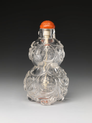 Snuff bottle in the shape of a gourd, rock crystal with coral stopper, late 18th–early 19th century China. (Metropolitan Museum of Art)