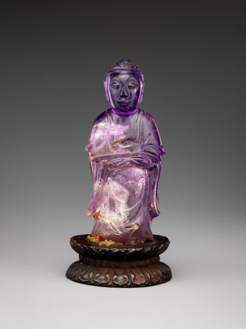 Standing Buddha carved of amethystine quartz, Qing dynasty (1644–1911), China. (Metropolitan Museum of Art)