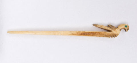 A Tang dynasty bone hair pin in the shape of a bird, inlaid with turquoise. (The Dr. Paul Singer Collection of Chinese Art of the Arthur M. Sackler Gallery)