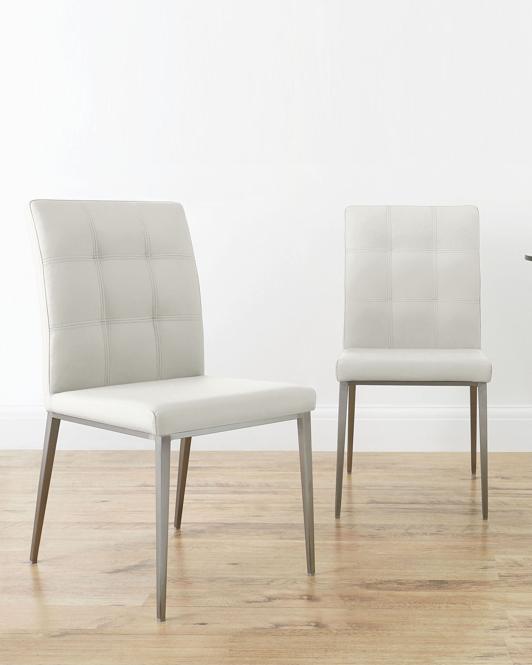 Moda Faux Leather Brushed Steel Dining Chairs Danetti
