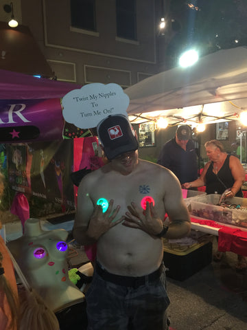 Guy Twisting LED Nips Key West Bike Week