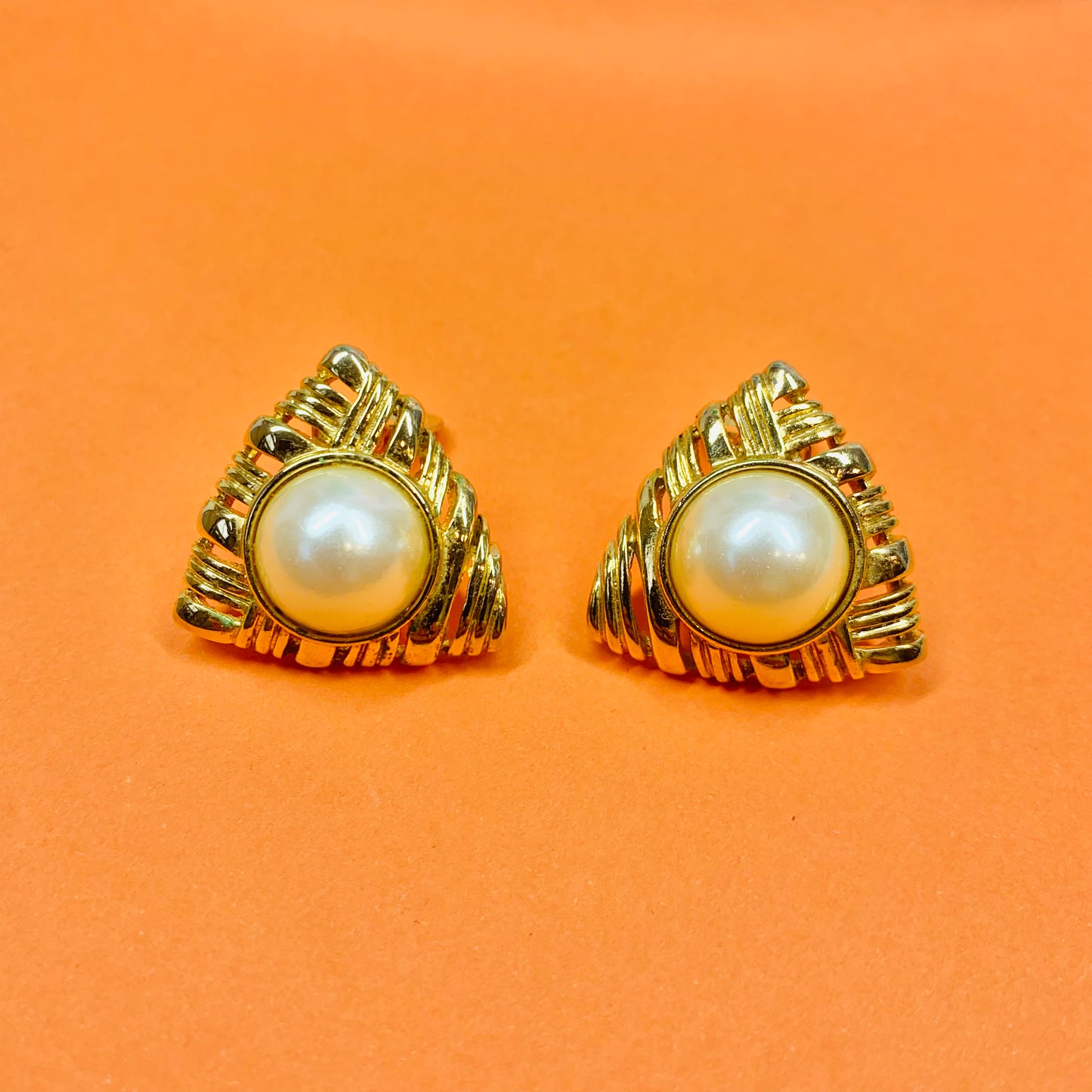 Rare stunning 1960s gold plated clip on triangular pearl button earrings with best panel border