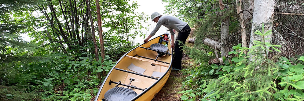 Portaging a canoe 