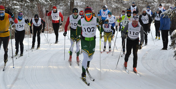 Cross country skiers racing in cold weather 