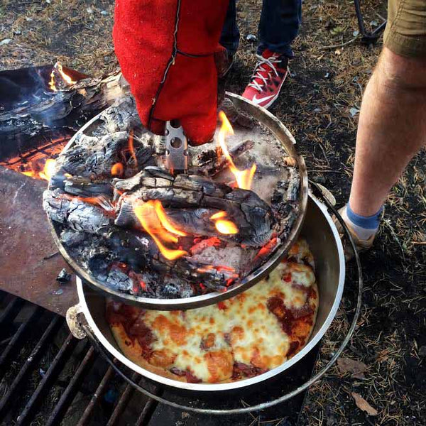 Dutch oven pizza over the fire