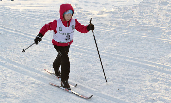 Child cross country skiing
