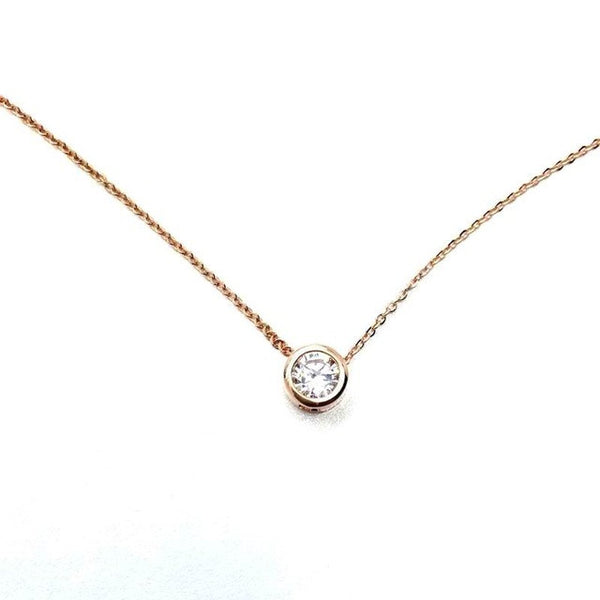 simple gold necklace with pendant