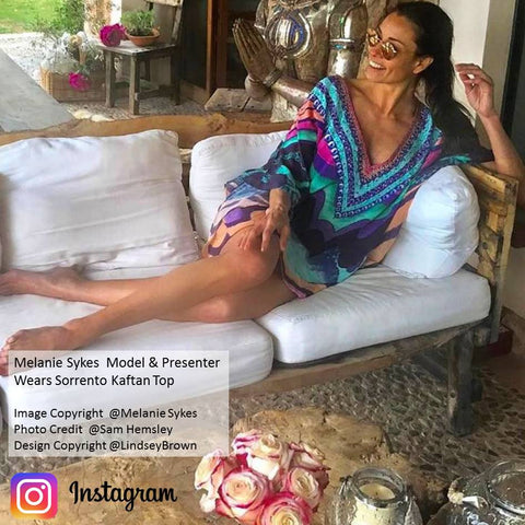 Melanie Sykes wears bright printed designer Kaftan Top by Lindsey Brown in Majorca villa