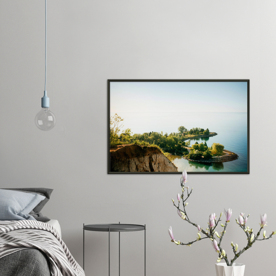 Lakeside cliffs and blue sky framed wall art print - Pretty Picture