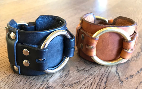 Black and brown leather bracelets with large brass ring and buckle 