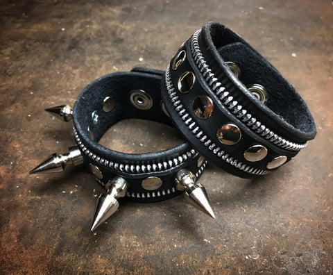 Black leather bracelets chrome spikes and zippers