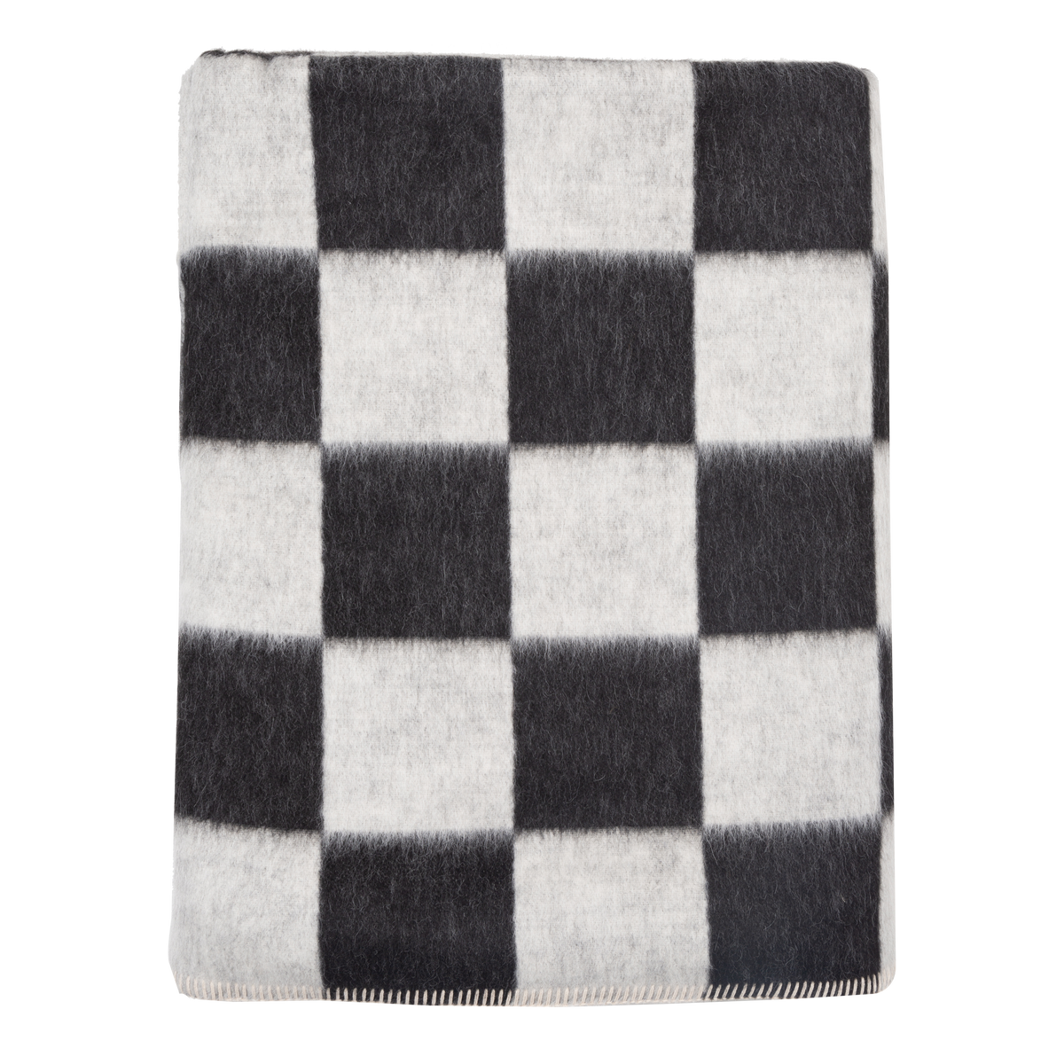 Presenting a luxuriously soft texture, the Crosby Check Throw is woven with natural superfine alpaca wool and undyed Peruvian cotton.