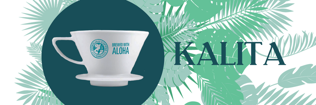 A Kalita Wave 185 brewer in front of tropical plants