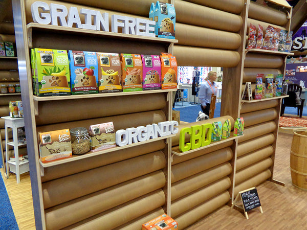 Pet Industry Tradeshow Booth Design with Log Cabin Aesthetic