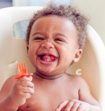 Lil' Sidekick founder Amy Vohs loves the Grabease utensil for mealtime with baby