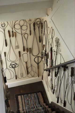 Rug Beater Wall Display