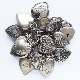 Antique and vintage sterling silver ornate puffy heart charm bracelet | Silver Star Charms