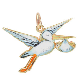 Stork and baby gold and enamel charm