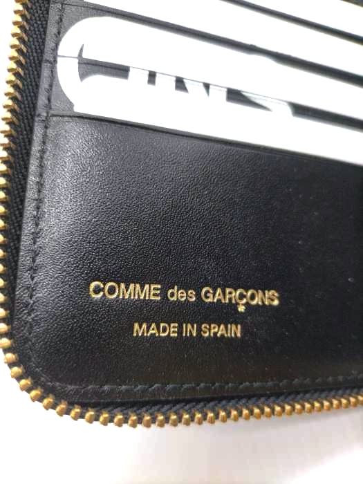 COMME des GARCONS(コムデギャルソン)Wallet HUGE LOGO MADE IN SPAIN 