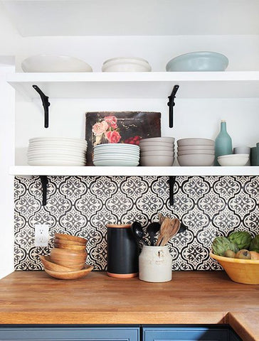 Kitchen shelves with plates and dishes