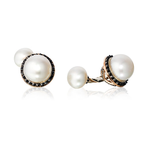 Cufflinks in 18k rose and white gold with 12–15 mm South Sea cultured pearls with 5.69 cts. t.w. black diamonds and rubies by Chris Faber of Stuller, Inc.