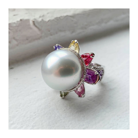 Serenity ring in 18k white gold with a 17.4 mm white South Sea pearl with 9.1 cts. t.w. multicolored sapphires and 0.91 ct. t.w. diamonds by Gina Ferranti of Gigi Ferranti
