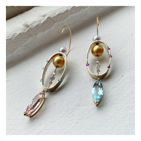 Magnetic earrings in 14k yellow and white gold with marquise-shape aquamarines and morganites, cultured golden South Sea and akoya pearls, pink sapphires, and blue and colorless diamond briolettes by Mark Loren
