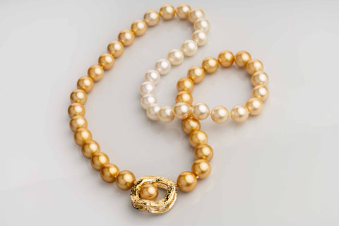 Golden pearl strand with Wavy O interchangeable clasp by Llyn Strong of Llyn Strong Jewelry