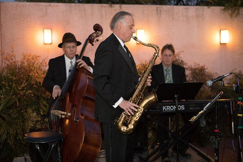 He’s with the band—seriously, the saxophonist is jamming with the band CPAA hired for the 2018 annual Pearl Soiree.