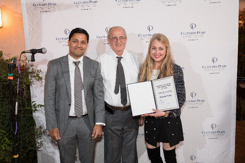 From left: Anil Maloo and Aziz Basalely with Elizabeth Dilly Kirby, CPAA member and owner of Elizabeth Blair Fine Pearls, who is receiving an IPDC award