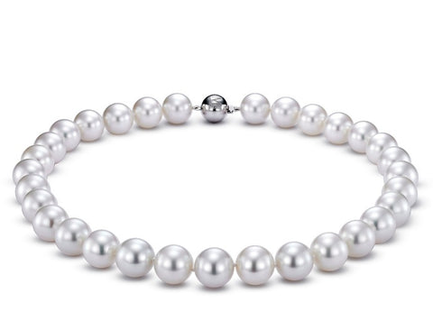 Necklace with 14 mm to 15 mm white South Sea pearls and an 18k white gold clasp, $126,000; Mastoloni