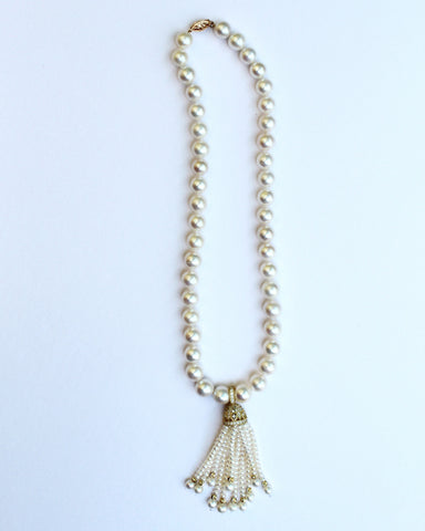 Necklace in 18k yellow gold vermeil with a 14k yellow gold clasp, 9.5 mm to 10 mm white freshwater pearls, and a removable tassel with cubic zirconia, $1,160; Brenda Smith