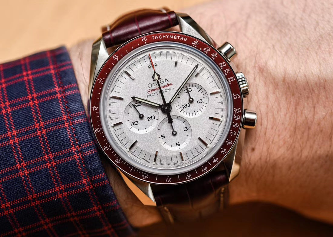 omega speedmaster rising sun