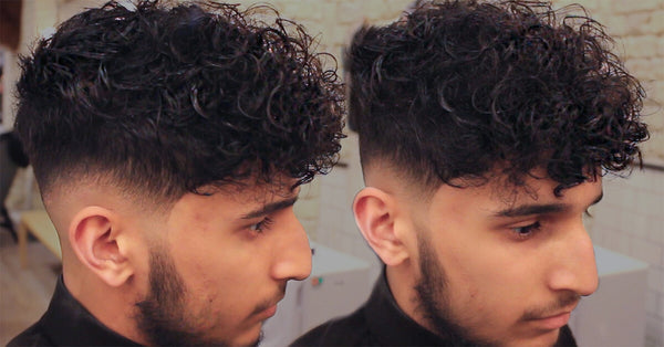 Low Skin Fade Curly Haircut With Disconnected Undercut