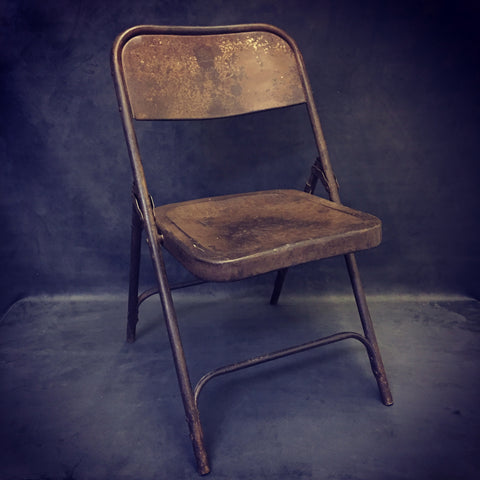 old metal folding chair