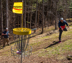 Disc golf teammates playing Island Disc Golf in PEI.