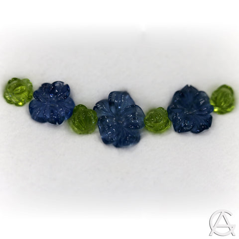 Goldart Carved aquamarine flowers carved peridot flowers