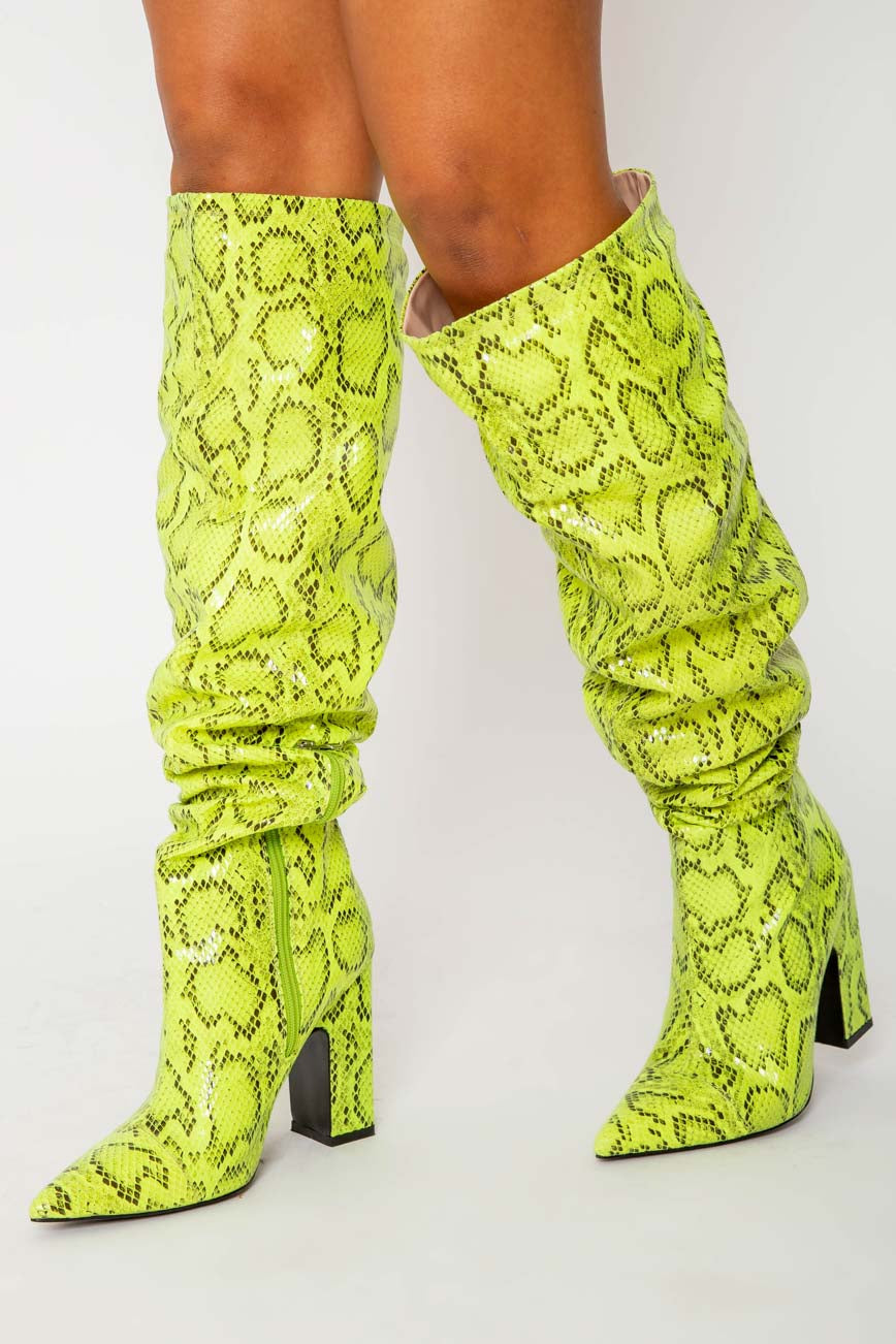 Nyla Slouch Boots In Neon Yellow Snake 