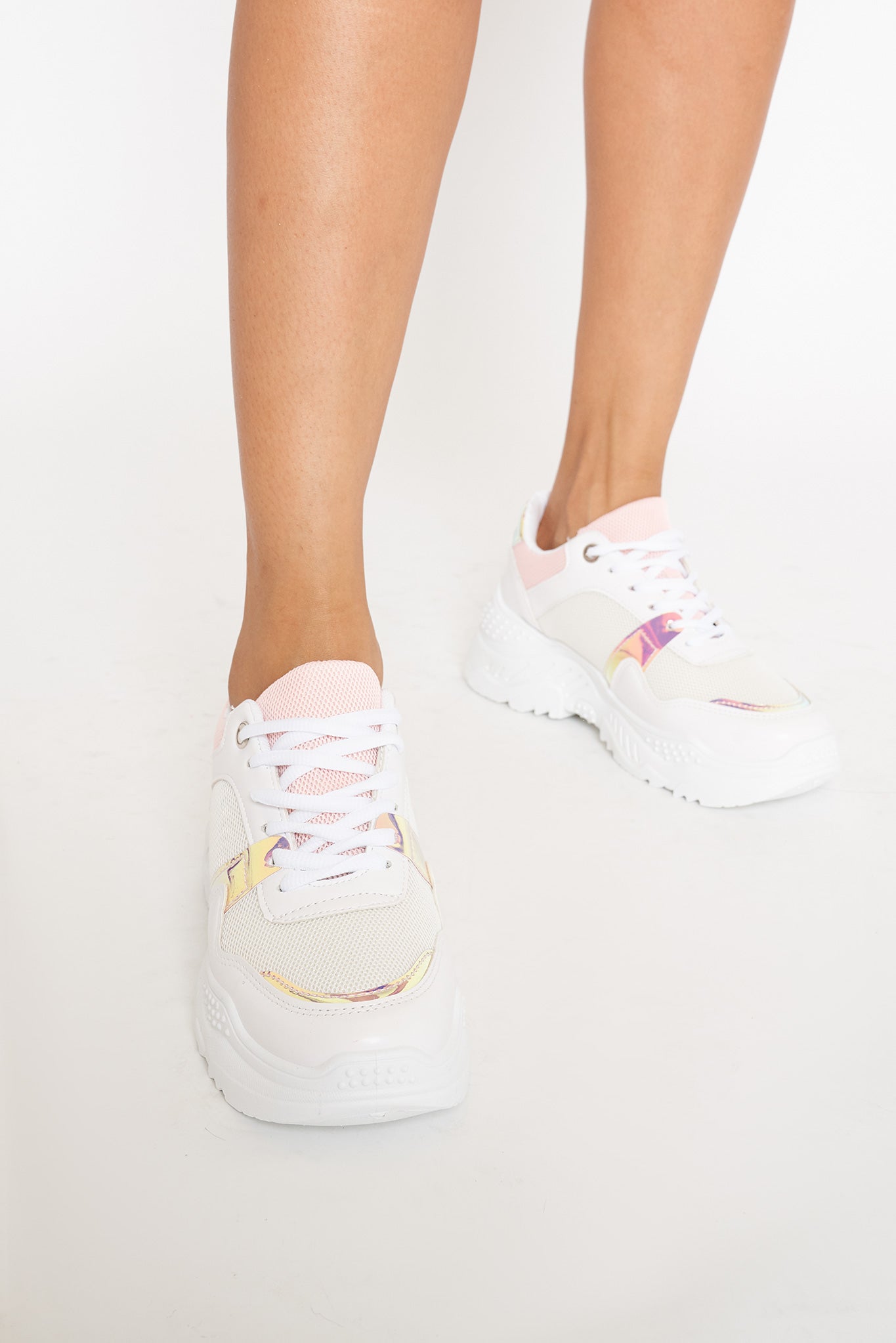 white and pink chunky trainers