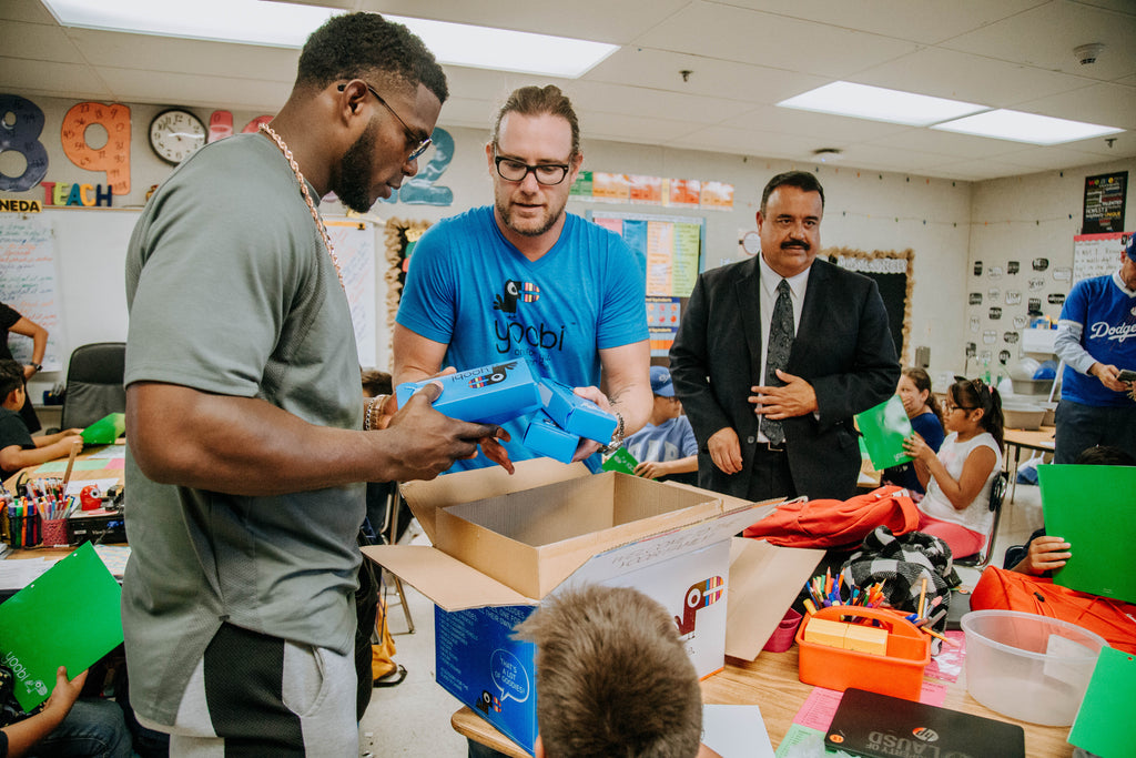 LA Dodger's Yasiel Puig handing out Yoobi school supplies at Euclid Elementary